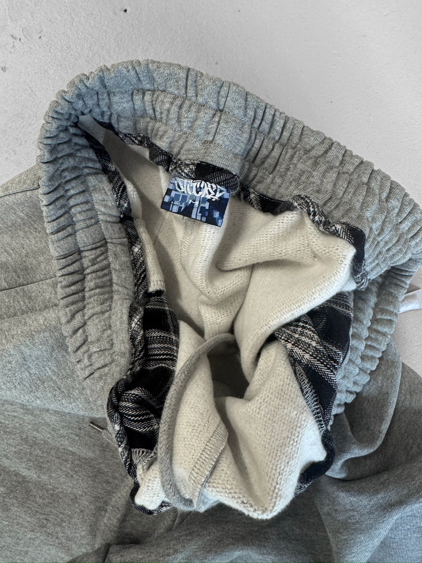 STOCKED PLAID JOGGERS