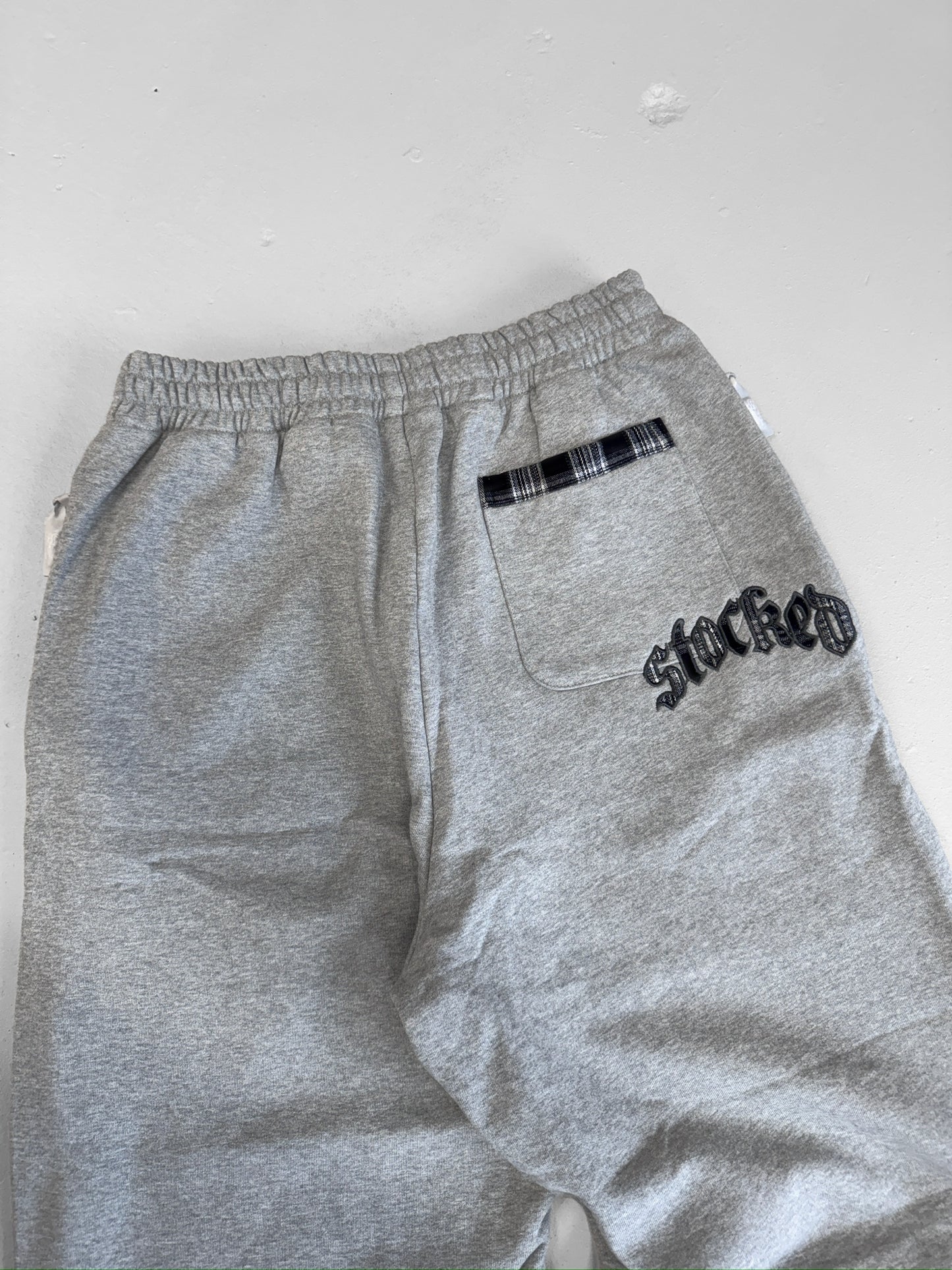 STOCKED PLAID JOGGERS