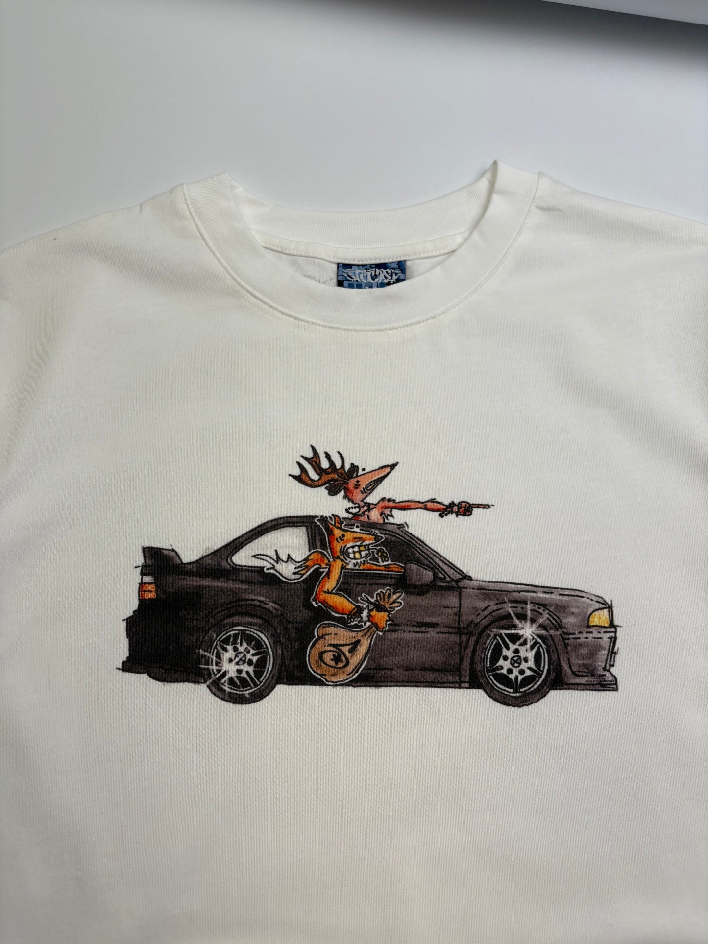 STOCKED 'PURP HEIST' TEE